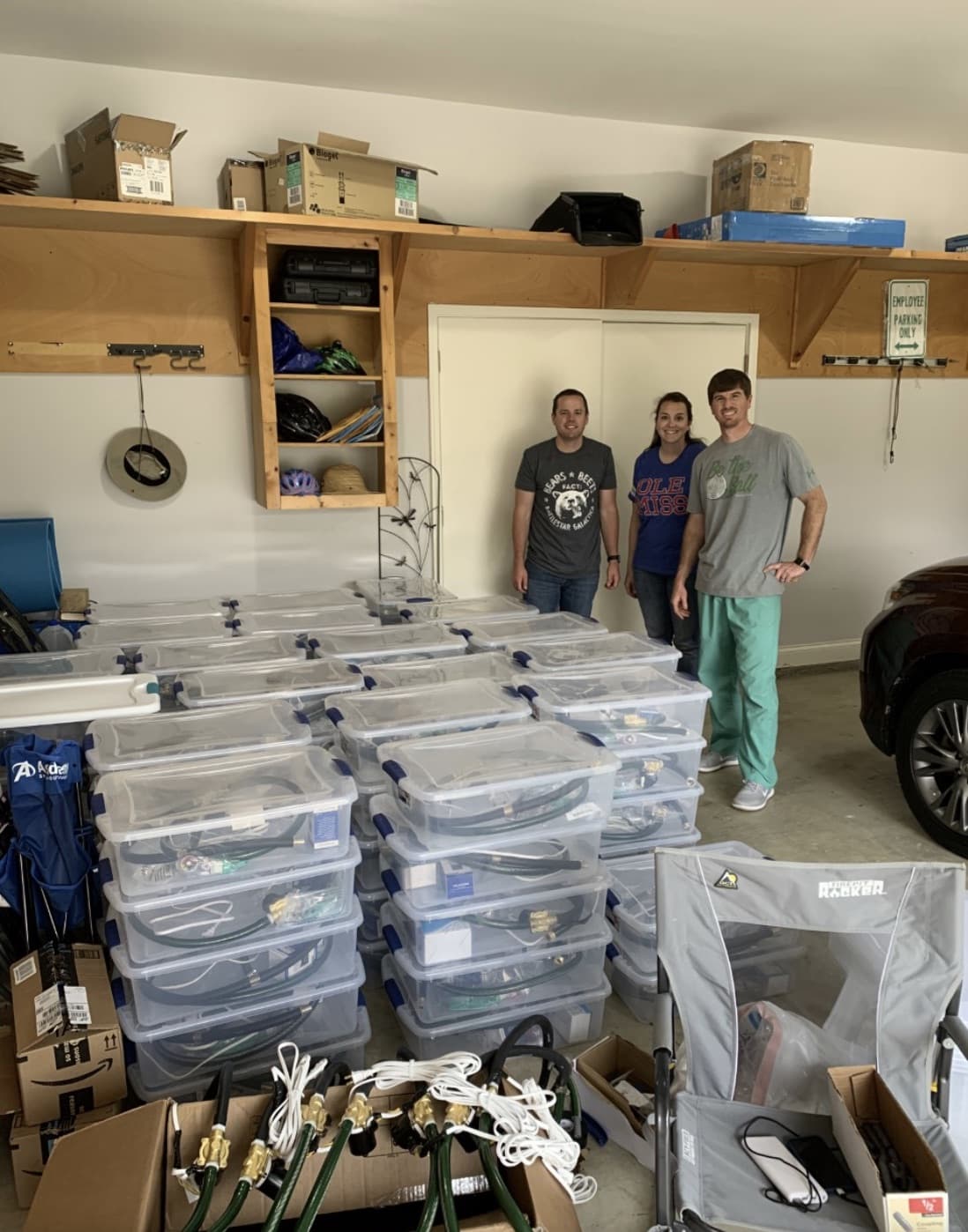 UMMC CRNAs Josh Fuqua, Maggie Ryals, and Wade May with a set of ventilators they built with Dr. Robertson.